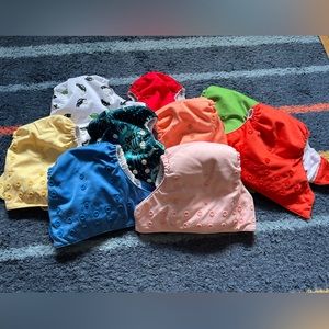 9 Bum Genius cloth diapers.